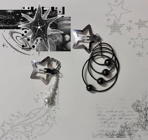 Space themed beaded star hairclips
