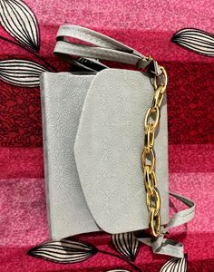 Stylish Grey Handbag with Gold Chain