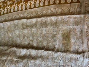 Elegant Brown Saree with Intricate Motifs