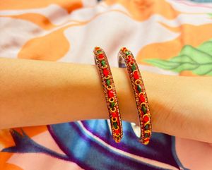 Vibrant Red and Green Stone-Studded Bangles