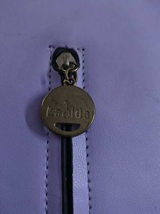 Lilac Handbag with Gold Accents