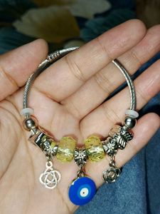 Charming Charm Bracelet with Yellow Beads
