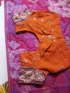 Elegant Orange Embroidered Saree