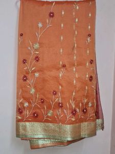 Elegant Orange Floral Saree🧡