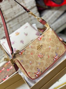 Coach Floral Print Wristlet Pouch