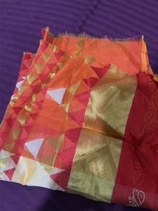Vibrant Orange Saree with Golden Accents