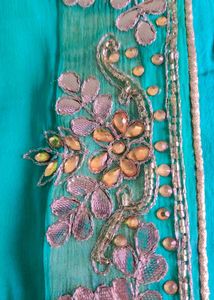 Elegant Turquoise Sea Green Georgette Saree with U
