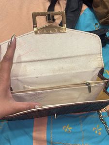 Elegant Brown Textured Clutch Bag