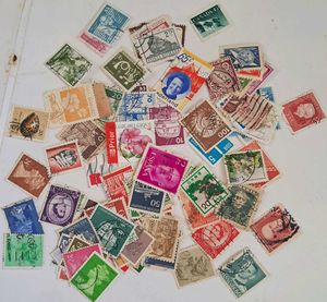 100 vintage stamps from various countries.