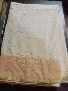 Elegant Cream Bandhani Saree