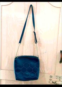 Beautiful blue sling bag with gold chain