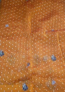 Elegant Orange Saree with White Polka Dots
