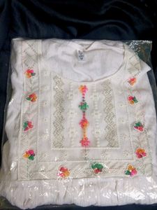 Elegant White Tiered Kurta with Tassels