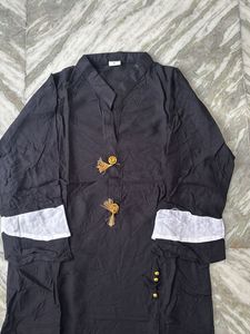 Elegant Black Kurta with White Accents