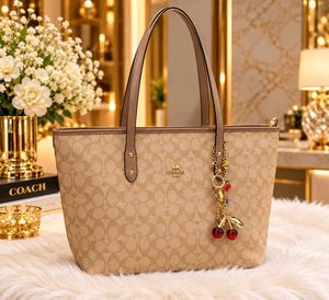 Coach Monogram Tote Bag with Charms