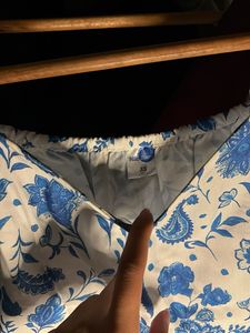Blue floral peplum top