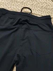 a black solid track pant