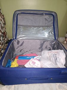 American Tourister Blue Suitcase