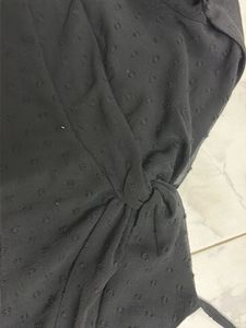 Chic Black Sheer Top with Bow Detail