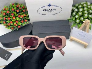Prada Sunglasses - Chic Pink Tinted Lenses