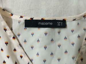 MADAME TOP