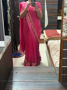 Elegant Pink Saree with Golden Detailing