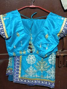 Elegant Teal Embroidered Saree
