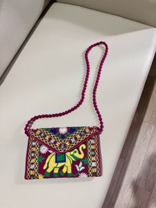 Embroidered Elephant Sling Bag