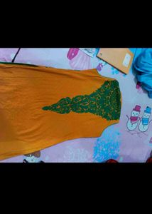 Orange Kurti with Green Leaf Print