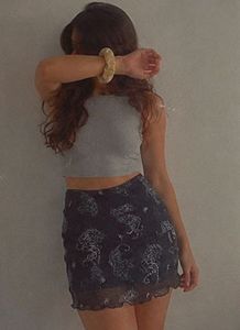 Tiger Print Mesh Mini Skirt