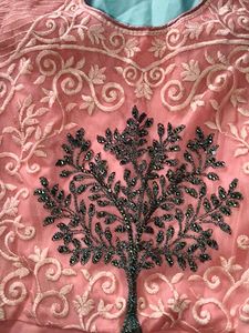 Elegant Peach Ethnic Gown with Tree Motif