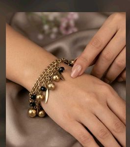 Gold Tone Charm Bracelet