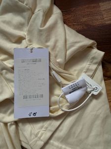 Cream Ruched Turtleneck Top