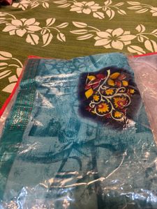 Beautiful Teal Saree with Embellishments