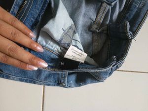 Distressed Blue Jeans with Paint Splatter