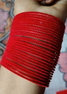 Elegant Gold-Tone Bangles with Tassel Charms