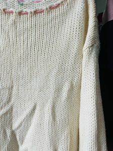 Cozy Cream Knit Sweater with Pink Accents