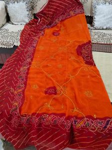 Vibrant orange rust coloured rajasthani odhni with