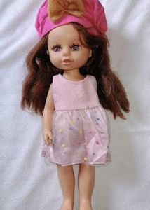 Vintage 1970s Doll with Pink Dress