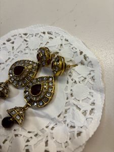 Exquisite Jhumka Earrings with Maroon Stones