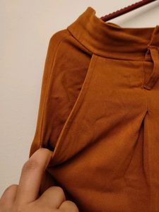 Stylish Rust Colored Pleated Trousers