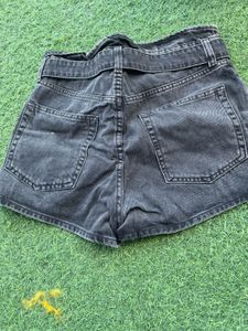 Black belted denim shorts
