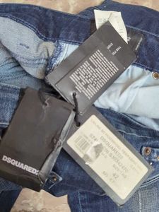 Stylish Dark Wash Jeans with Unique Embellishments