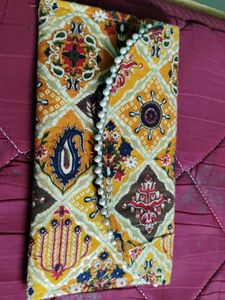 Boho Clutch with small beads.