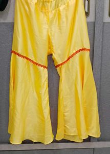 Vibrant Yellow Kurta with Colorful Tassels