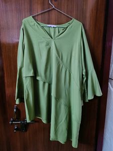 This is a Beautiful green colour Top... It's so fashionable as you can see in the picture... It's real price is also mentioned... I bought it resently... from Mintra....