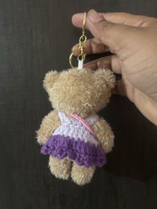 This adorable plush teddy bear keychain features