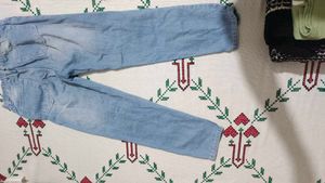 Distressed Blue Jeans
