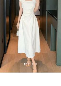 Elegant White Midi Dress