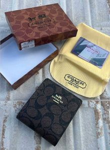 Coach Signature Print Bi-fold Wallet